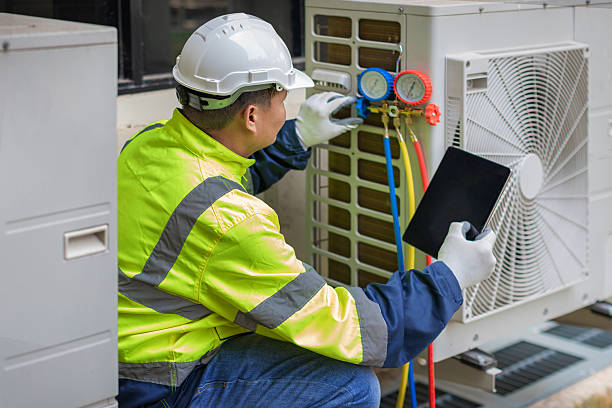 Professional Air Duct Cleaning technician working in Brevard, NC